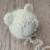 Knitted Bonnet with Tiny Bows