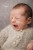Grey Melange Backdrop and grey newborn romper in use.jpg