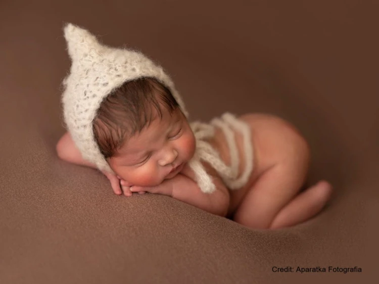 Amy cappucino newborn photography backdrop in use.jpg