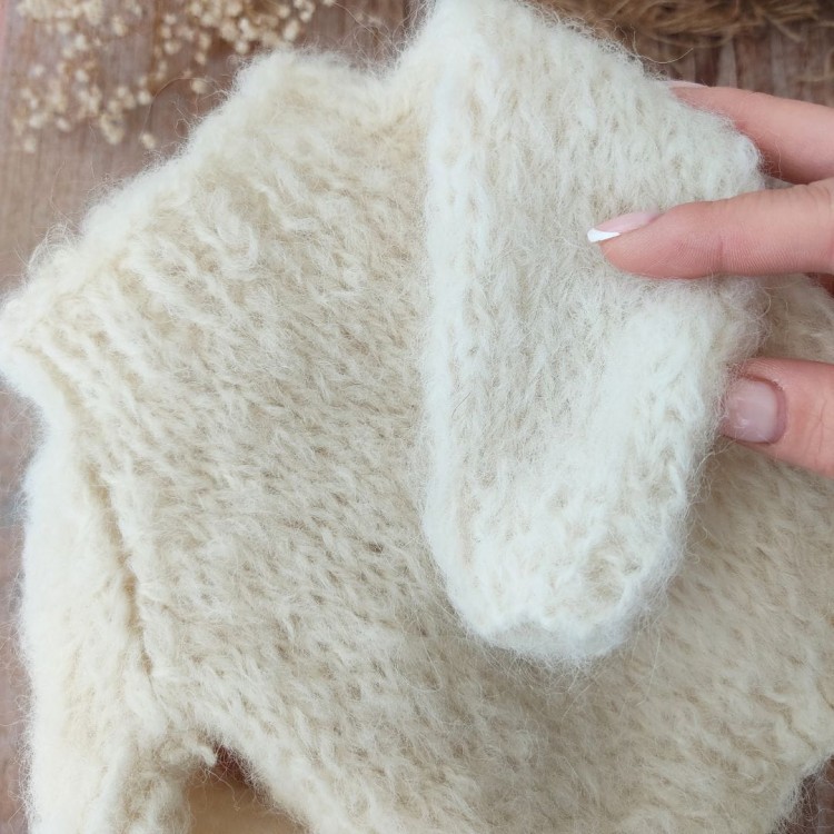 hand-knitted-pullover-for-newborn-photography-close-up.jpg