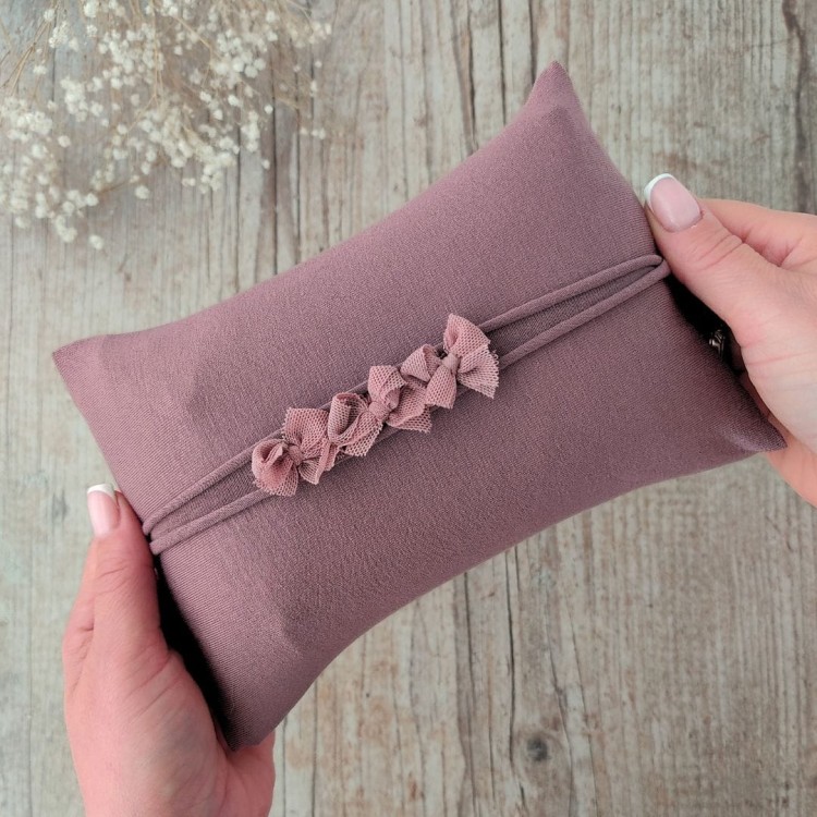 newborn-pillow-and-headband-close-up-megan-purple-brown.jpg