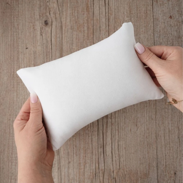 Mila Off White decorative pillow for coordinated newborn photography styling.jpg