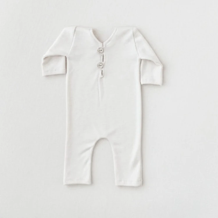 stella-white ecruromper and backdrop.jpg