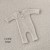 newborn-romper-cuddly-light-beige.jpg
