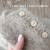 fluffy-knitted-romper-with-bottons-close-up.jpg