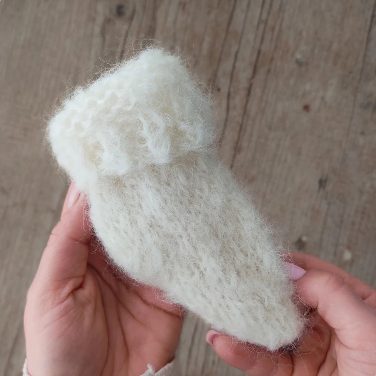 off white newborn knitted sock - close up.jpg