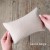 newborn-pillow-posing-pillow-photography-collection-laura-beige.jpg