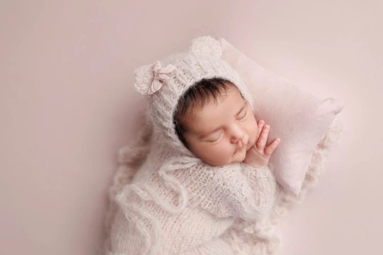 newborn outfit with matching backdrop, blanket and pillow set in use - Amaia Photo Props.jpg
