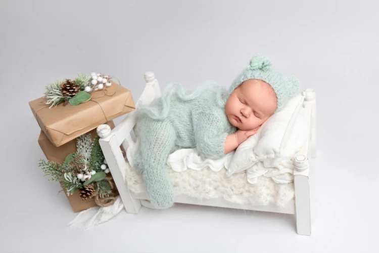 sage-newborn-romper-and-teddy-hat-with-cute-bow-in-use.jpg