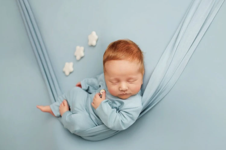 pola sea green romper, backdrop, wrap in use.jpg